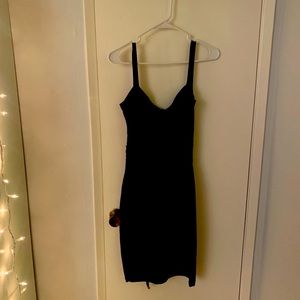 Fitted black pencil dress